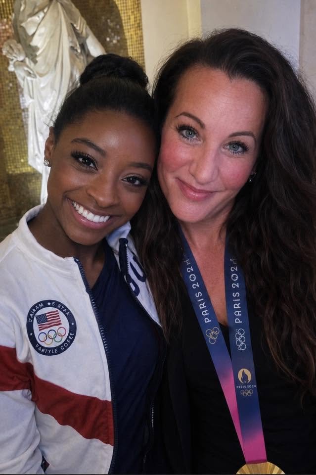 Coach Renee with a Team USA gymnast at the Paris 2024 Olympic Games